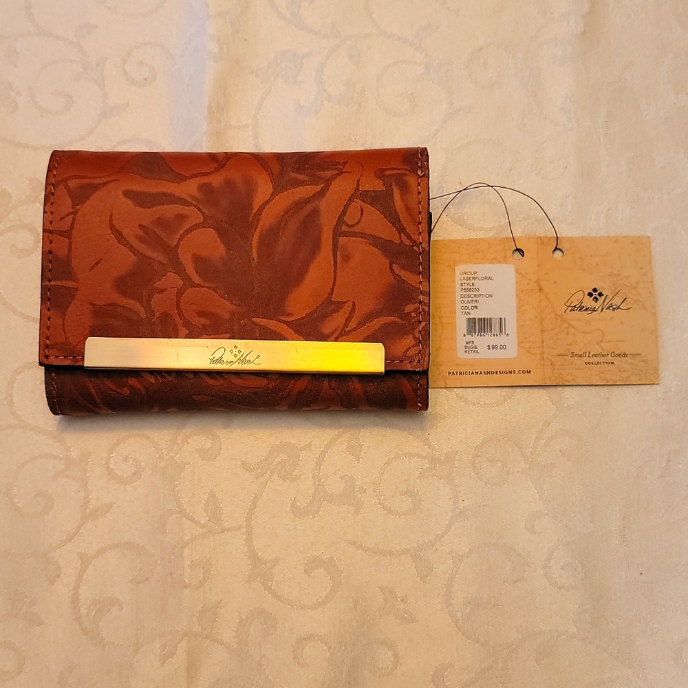 New with tags. Patricia Nash Laser Floral Wallet.